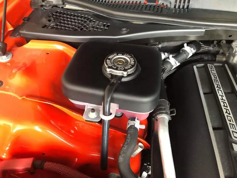 Jlt 15-19 Dodge Hellcat Black Textured Intercooler Tank Cover 1